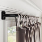 UIOSANRT Curtain Rods for Windows 48 to 84 inch, 5/8" Diameter Black Curtain - Image 2